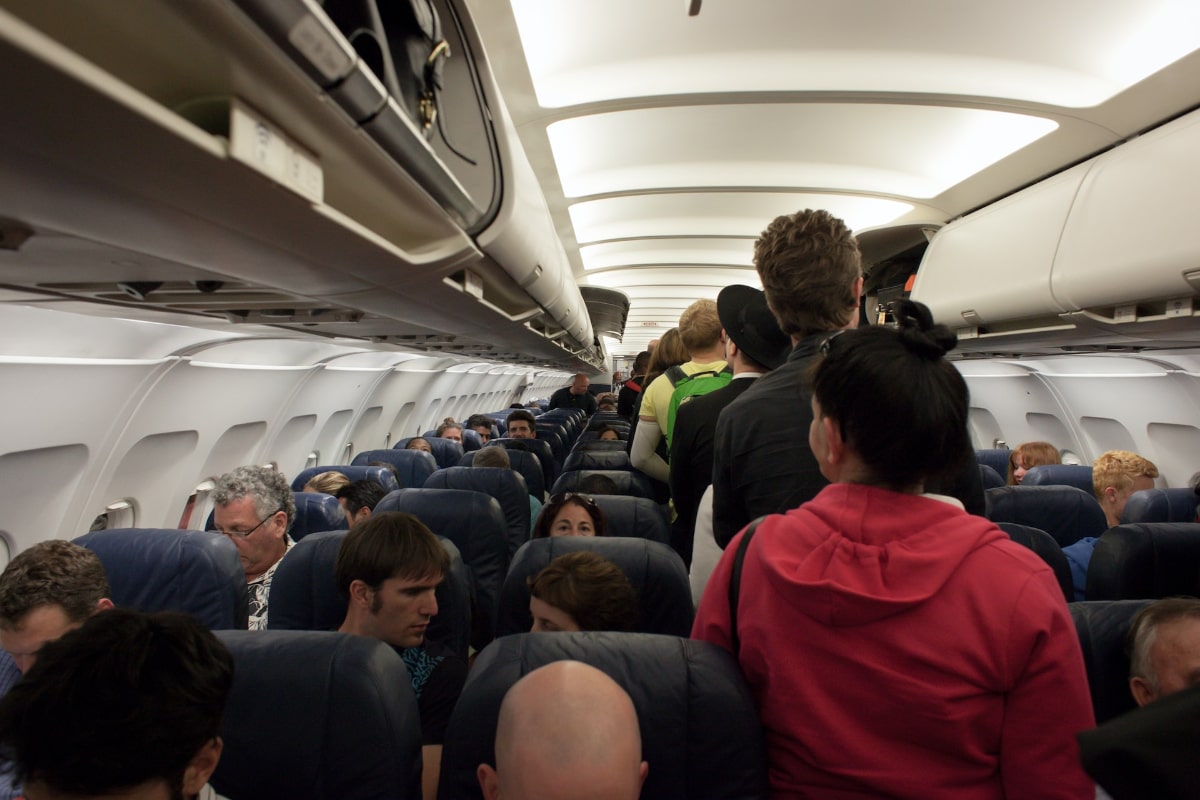 avion passagers bagage cabine touristes